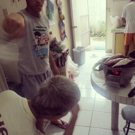 Fanning the grillmaster.