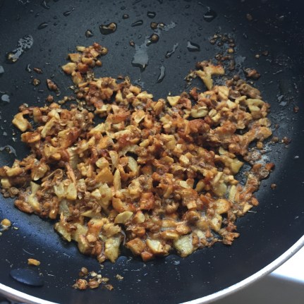 Taqliyah: A mixture of fried minced garlic and coriander seeds
